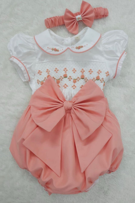 Coral peach smocked romper comes with hair bows or headband for baby sizes